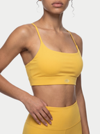 YELLOW CRISS CROSS SPORTS BRA